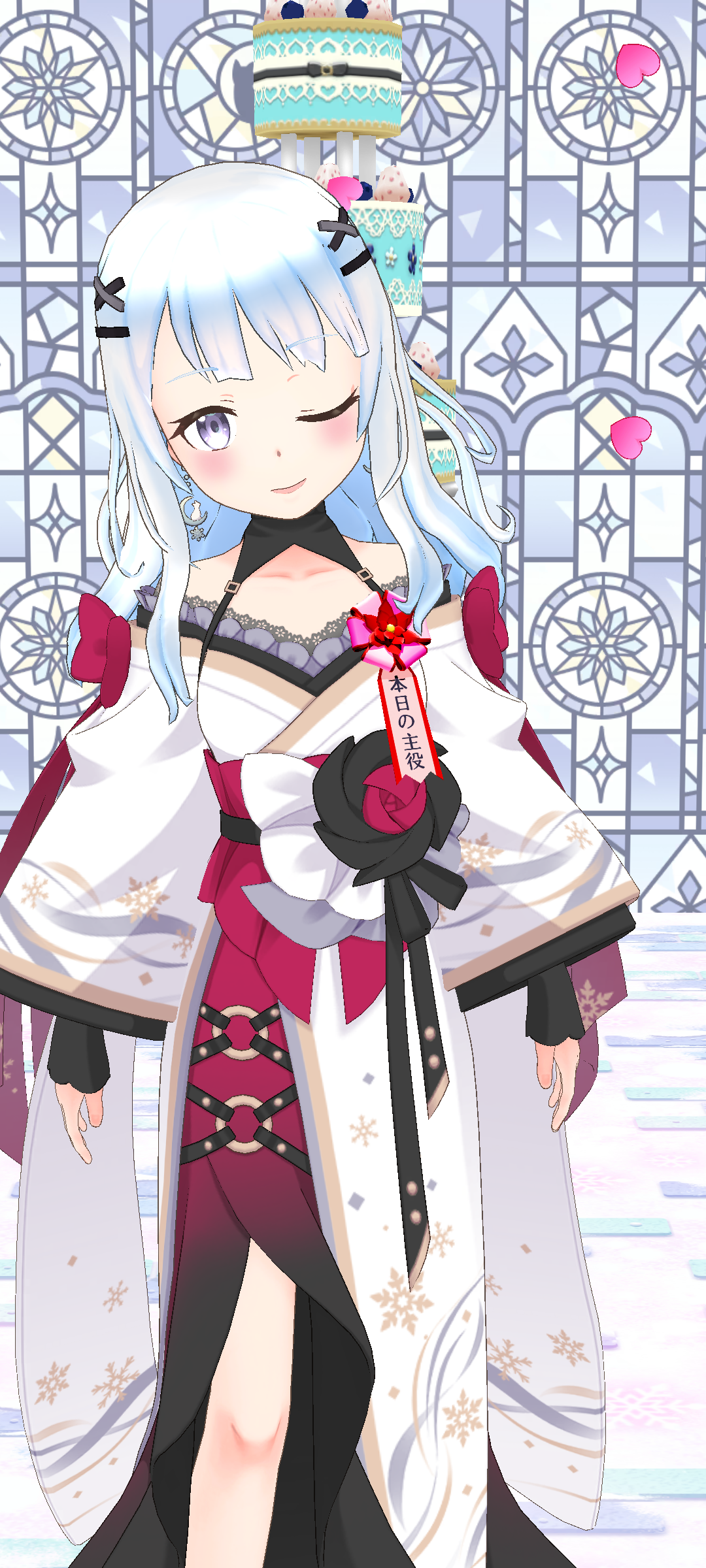 お祝い衣装でウインクする結希さん